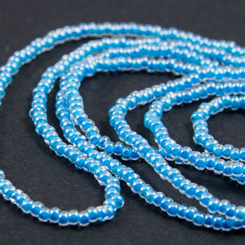 0256 Half hank 13/0 sead bead transparent blue lined