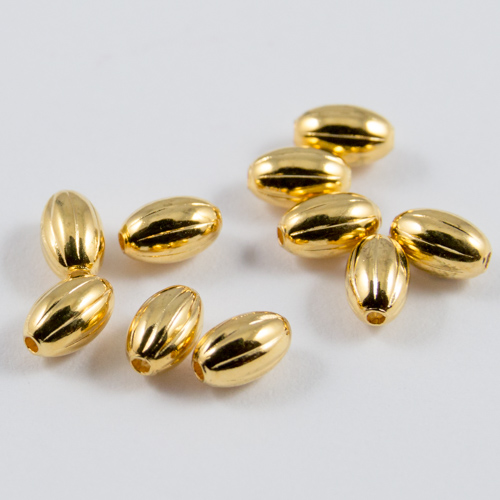 Gilt oval corrugated beads 5x3mm